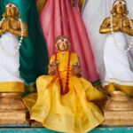 statues man praying scaled 1