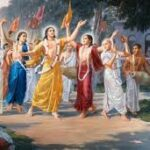 Devotees singing and dancing in image.