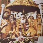 Swami Brahmananda Saraswati blessing devotees during spiritual gathering