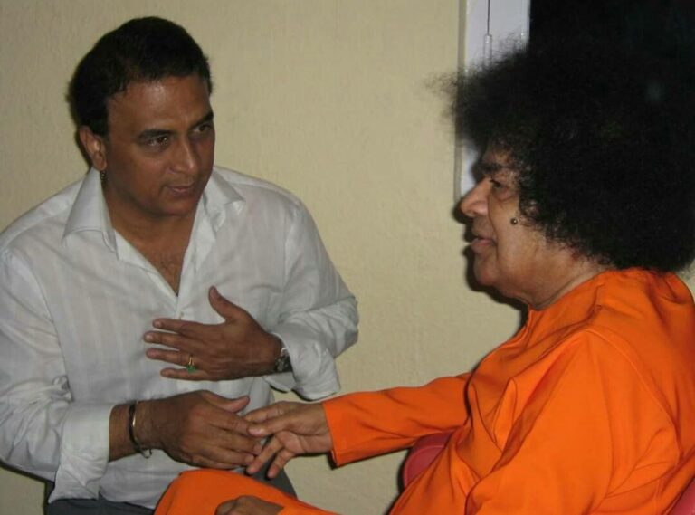Sai Baba meeting devotee during spiritual interaction