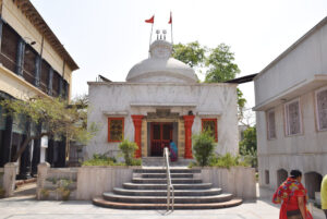 Sacred Hindu temple entrance with white marble architecture beautifully
