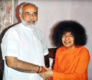 Sri Sathya Sai with Narendra photo