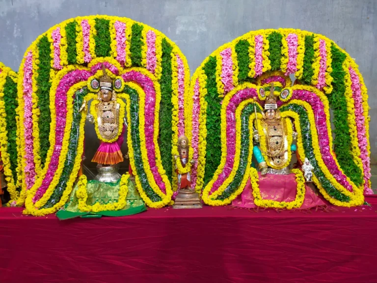 Floral adorned Hindu deities with sacred decorations
