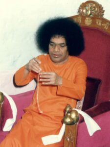 Sathya Sai Baba holding mala image