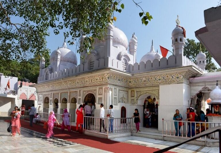 White Hindu temple with domes image