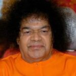 Closeup spiritual leader wearing orange robe photo