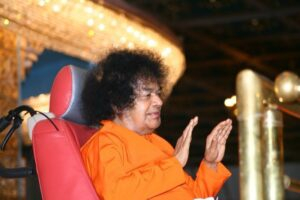 Spiritual leader raising both hands blessing photo