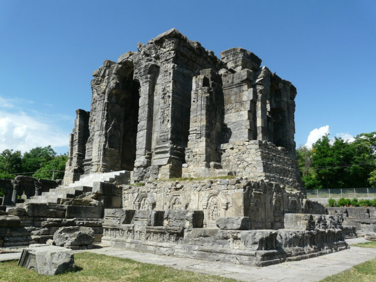 Ancient stone temple ruins under sky photo