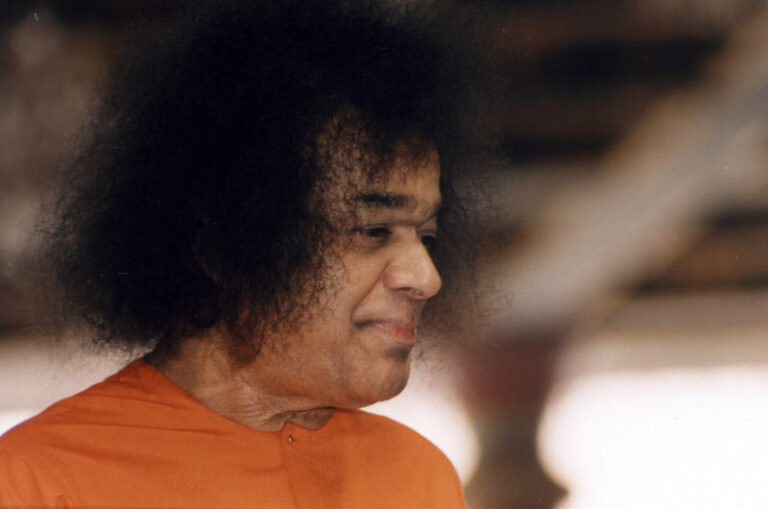 Bhagwan Shri Sathya Sai Baba serene spiritual gathering image, Surrender