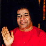 Sathya Sai Baba blessing with hand.