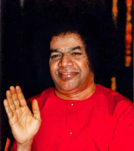 Sathya Sai Baba blessing with hand.