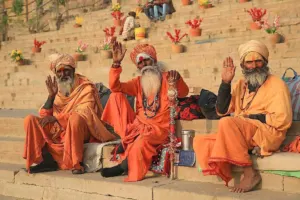 Three Hindu sadhus offering blessings image