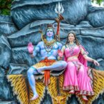 Lord Shiva and Goddess Parvati seated together image