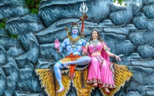 Lord Shiva and Goddess Parvati seated together image