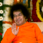 Shri Sathya Sai Baba blessing devotees