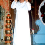 Shri Sathya Sai Baba blessing devotees