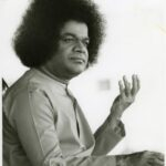 Shri Sathya Sai Baba teaching devotees image