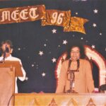 Spiritual leader speaking at event photo