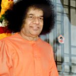 Sathya Sai Baba at temple discourse picture.