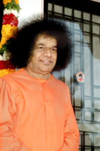 Sathya Sai Baba at temple discourse picture.
