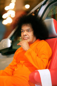 Sathya Sai Baba in car portrait picture.
