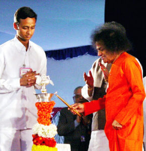 Shri Sathya Sai Baba lamp blessing picture.