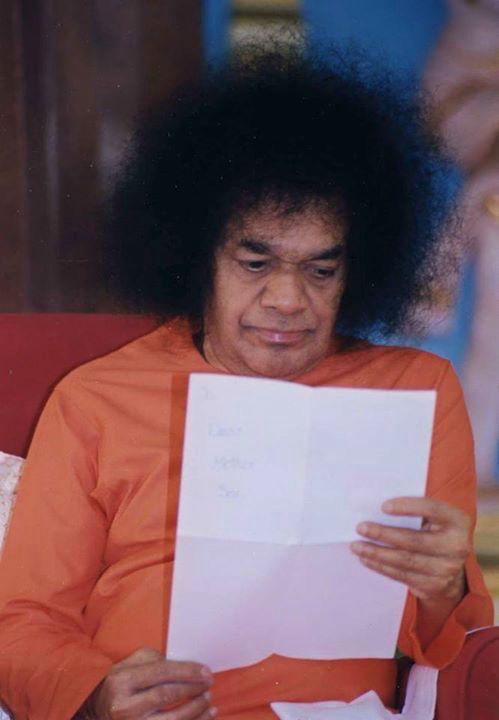 Bhagwan Shri Sathya Sai Baba blessing devotees gathering image