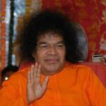 Sathya Sai Baba giving a blessing photo