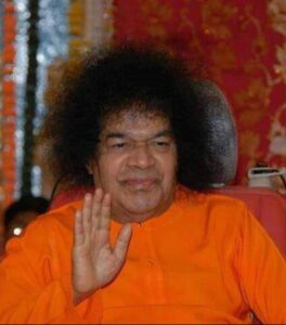 Sathya Sai Baba giving a blessing photo