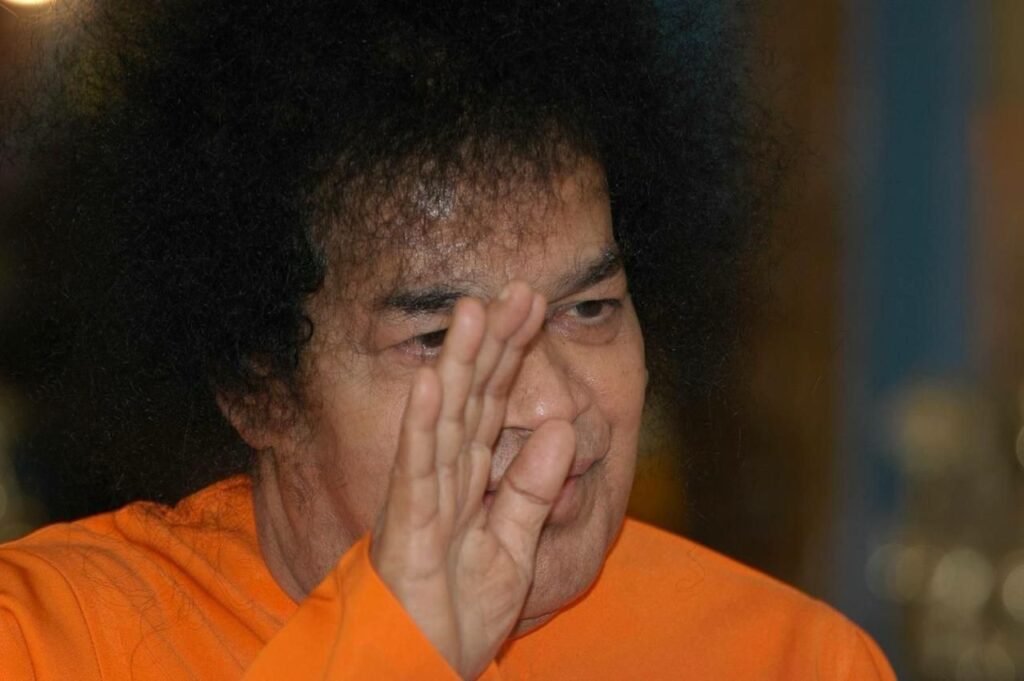 History of the Mandir 54 Shri Sathya Sai Baba blessing children compassionate image