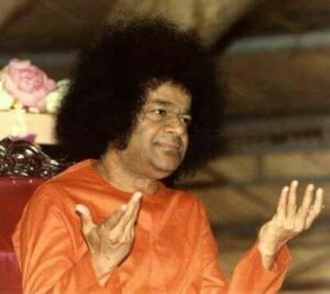Sathya Sai Baba raising both hands