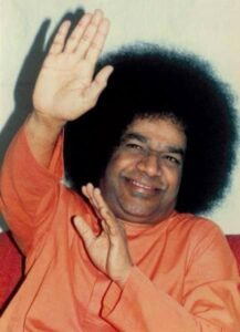 Shri Sathya Sai Baba waving hands photo