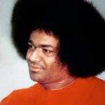 Sathya Sai Baba looking away photo.