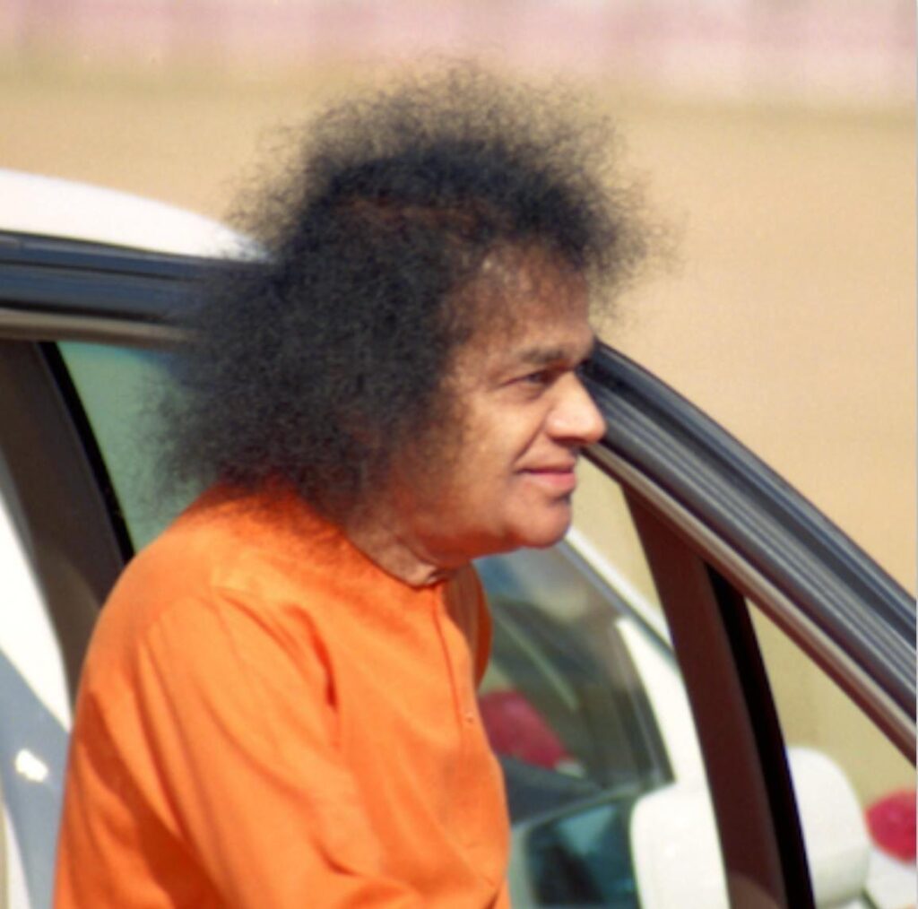 Shri Sathya Sai Baba orange robe peaceful portrait image
