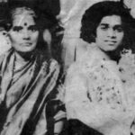 Two devotees seated together in vintage photo