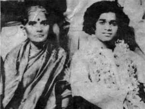 Two devotees seated together in vintage photo