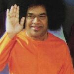 Shri Sathya Sai Baba blessing devotees image