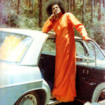 Sathya Sai Baba giving blessings to devotees picture