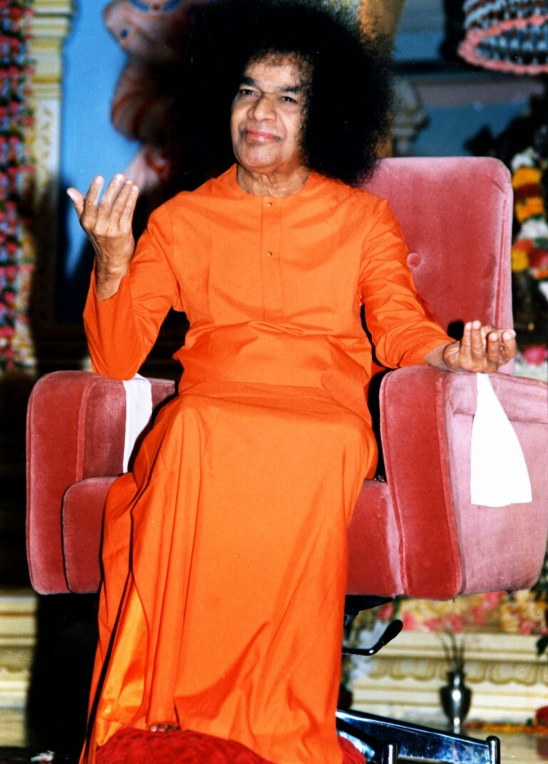Bhagwan Sathya Sai Baba blessing with compassion photo