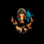 Lord Ganesha with divine blue glowing aura