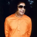 Bhagwan Shri Sathya Sai Baba wearing sunglasses outdoors