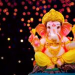 Lord Ganesha idol with festive glowing lights