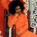 Sri Sathya Sai Baba seated in peaceful meditation