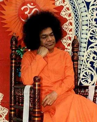 Person seated in traditional attire.