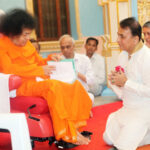 Shri Sathya Sai Baba blessing Sunil Gavaskar