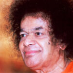 Shri Sathya Sai Baba smiling close-up portrait