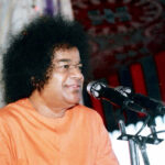 Shri Sathya Sai Baba delivering spiritual discourse