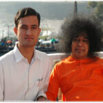 Shri Sathya Sai Baba with devotee