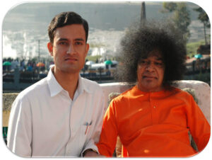 Shri Sathya Sai Baba with devotee
