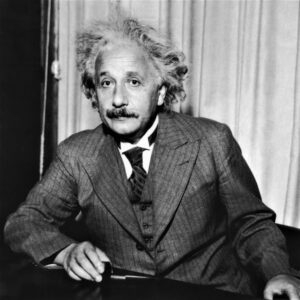 Albert Einstein portrait in thoughtful seated pose